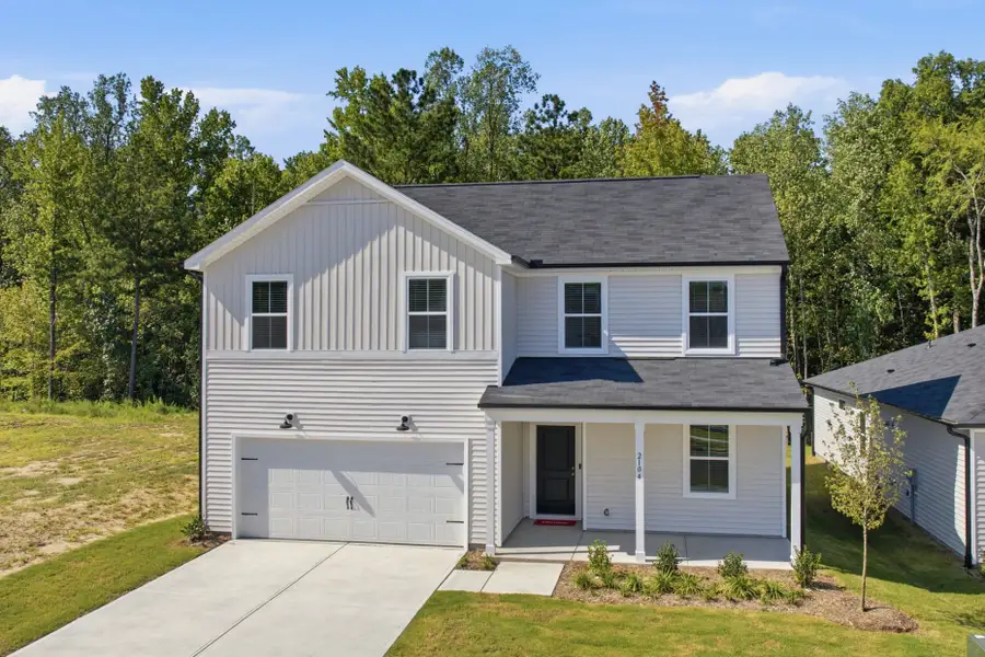 Front exterior of a new home in Carpenter Falls, Durham, NC, highlighting curb appeal (Image 29).