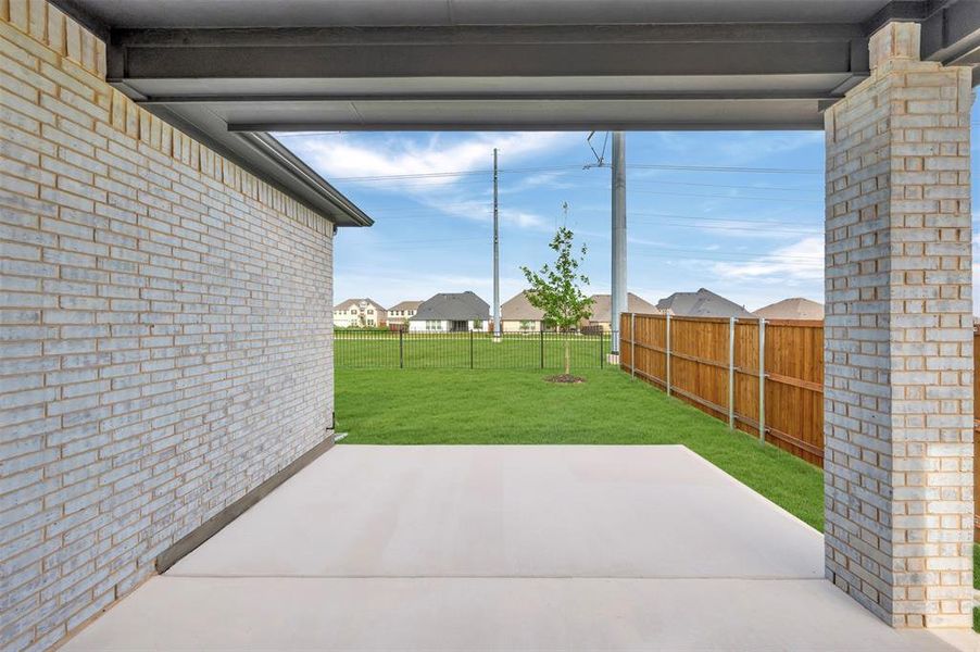 Exterior details and patio area of a home in Wellington, Haslet (Image 18).