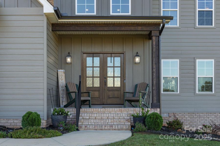 Front exterior of a new home in , Mocksville, NC, highlighting curb appeal (Image 22).