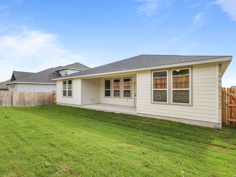 Exterior details and patio area of a home in The Reserve at Potranco Oaks, Castroville (Image 3).
