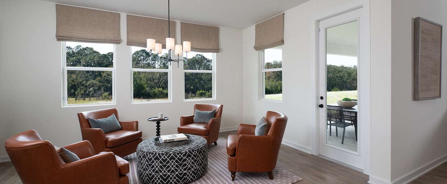 Representative furnished interior of a home built from the Moseley by Ashton Woods in Lake Cawood Cove, Windermere (Image 12).