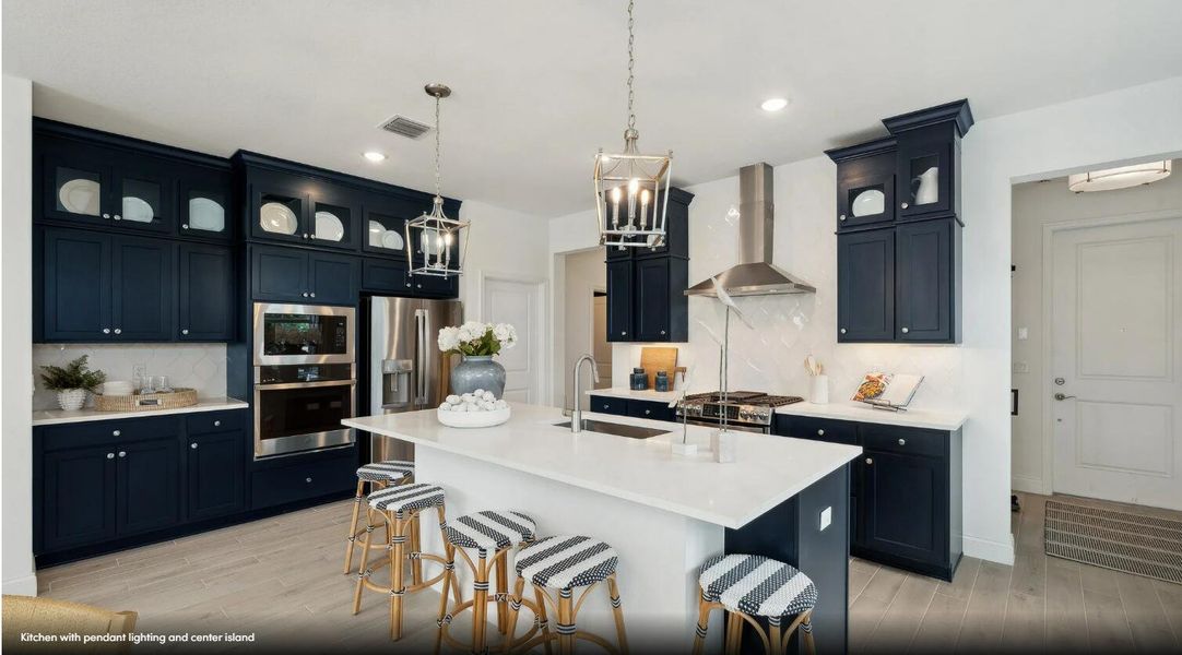 Furnished interior view inside a new home in K. Hovnanian's® Four Seasons at Lakes of Cane Bay, Summerville (Image 5).