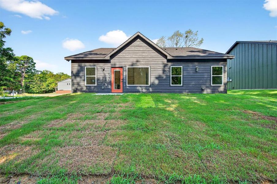 Front exterior of a new home in , Denison, TX, highlighting curb appeal (Image 17). Front exterior of a new home in , Denison, TX, highlighting curb appeal (Image 17).