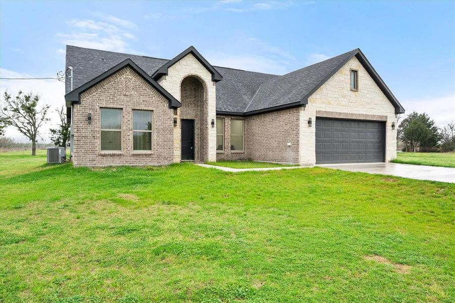 Front exterior of a new home in , Barry, TX, highlighting curb appeal (Image 26).