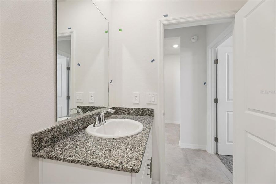 Furnished interior view inside a new home in Crosswinds - Signature Series, Haines City (Image 13).