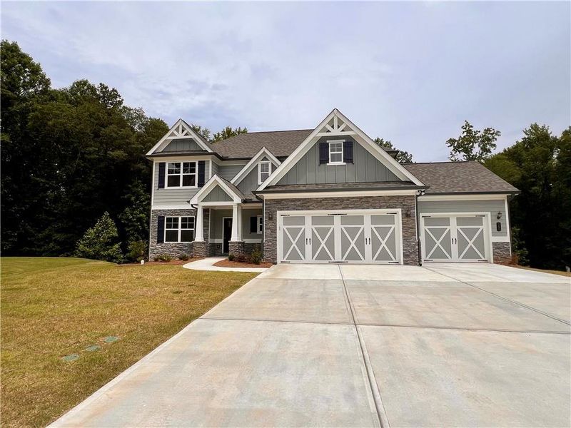 Front exterior of a new home in , Jefferson, GA, highlighting curb appeal (Image 2).