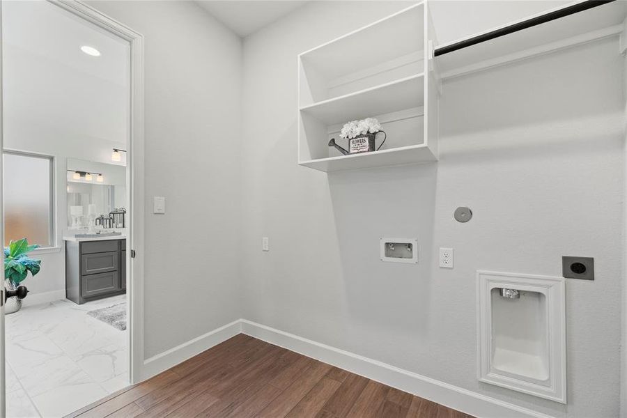 Utility room with storage shelves.