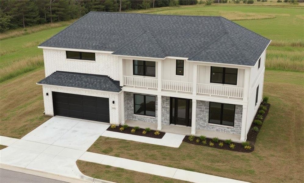 Front exterior of a new home in , Buford, GA, highlighting curb appeal (Image 1). Front exterior of a new home in , Buford, GA, highlighting curb appeal (Image 1).