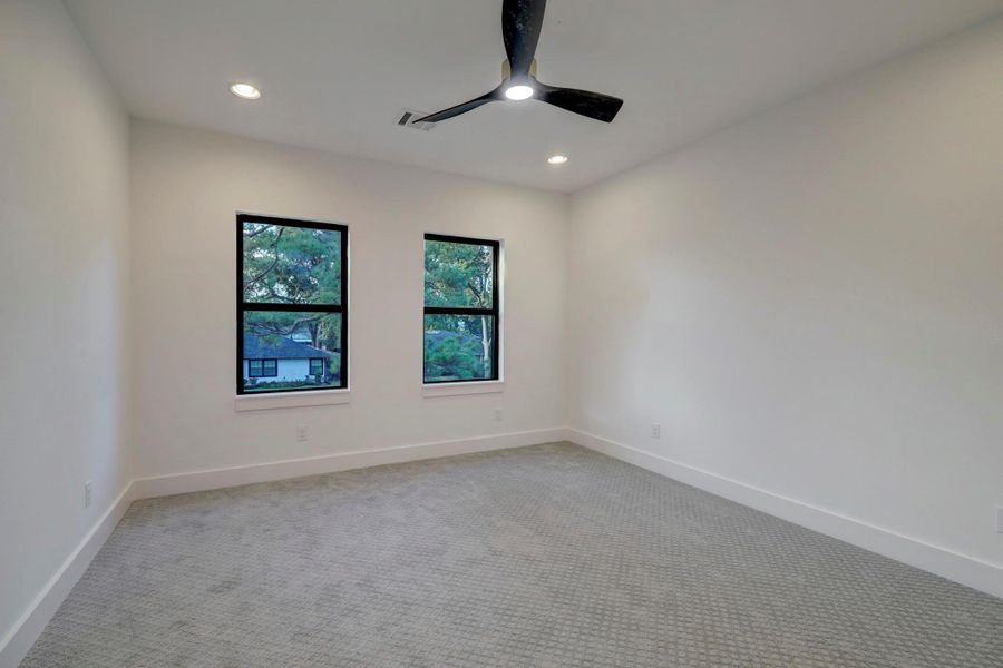 Three generously sized secondary bedrooms upstairs*photos are of a previously constructed home by the builder. 1527 Hewitt may have different selections at builders sole discretion. These photos are not meant to be an exact representation of 1527 Hewitt.