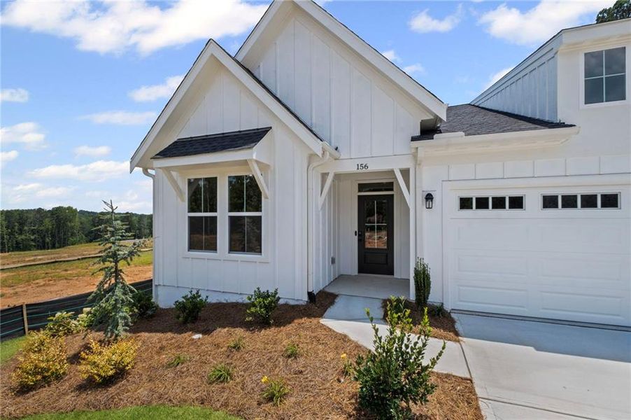 Front exterior of a new home in Easton Park, Dallas, GA, highlighting curb appeal (Image 21).