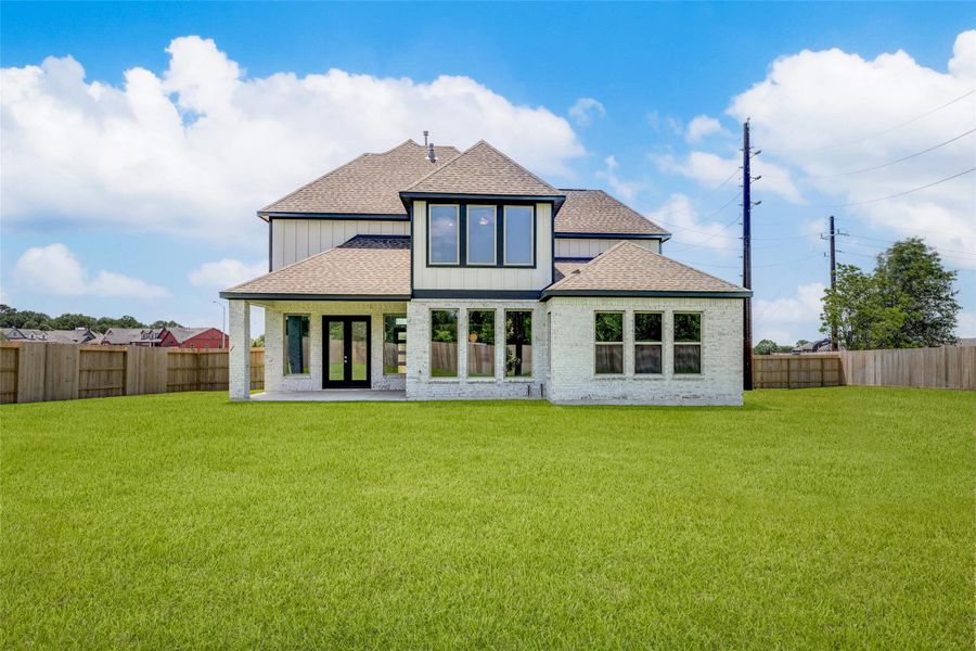 Exterior details and patio area of a home in , Sealy (Image 3).