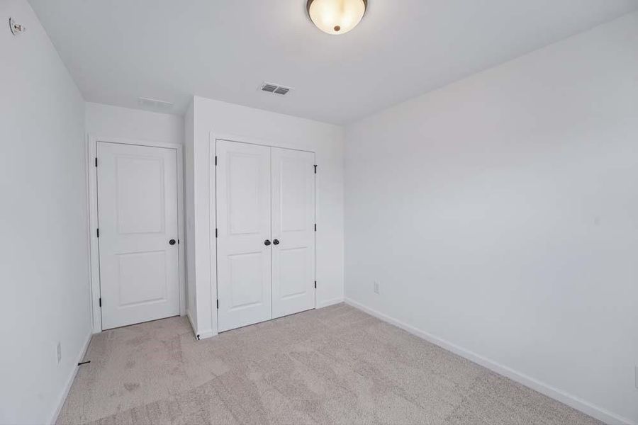 Spacious, unfurnished interior of a new home in Laurelwood, Douglasville (Image 30).