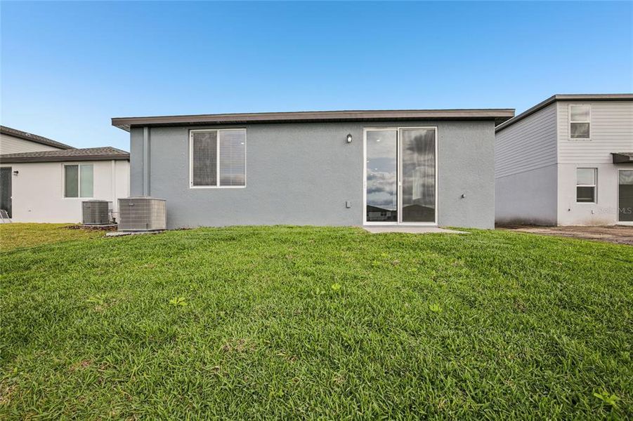 Exterior details and patio area of a home in Salt Meadows - Premier Series, Parrish (Image 3).