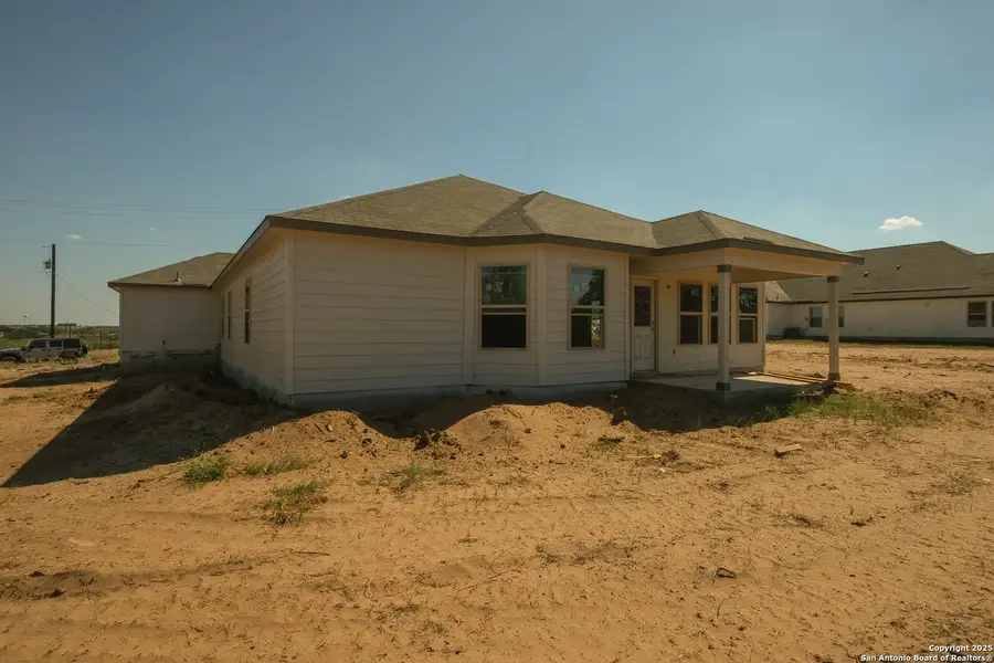 Exterior details and patio area of a home in Chaparral Ranch, Floresville (Image 16). Exterior details and patio area of a home in Chaparral Ranch, Floresville (Image 16).