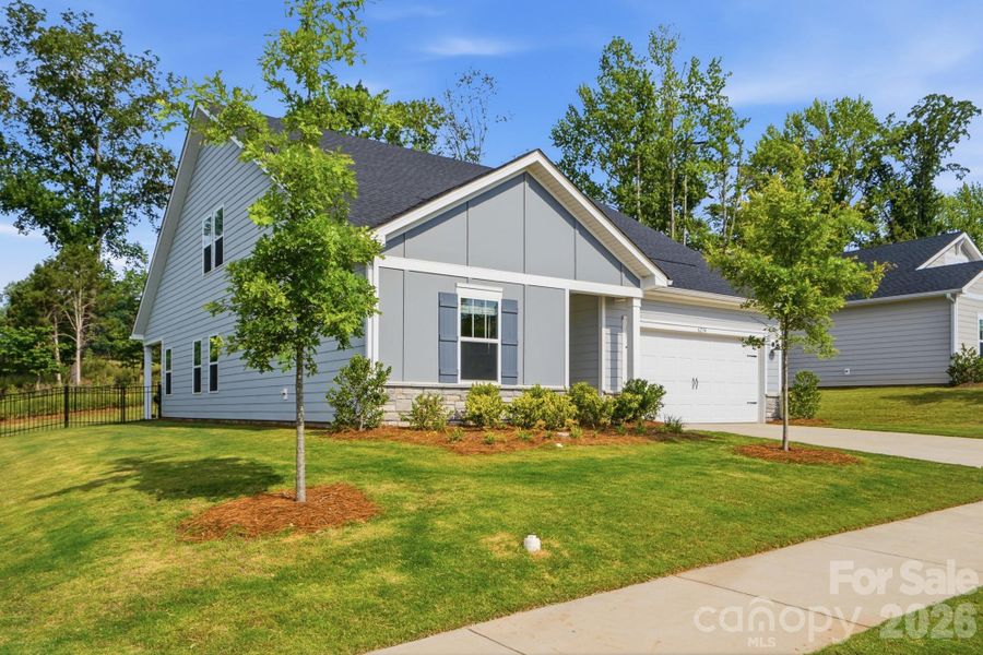 Front exterior of a new home in , Charlotte, NC, highlighting curb appeal (Image 21).