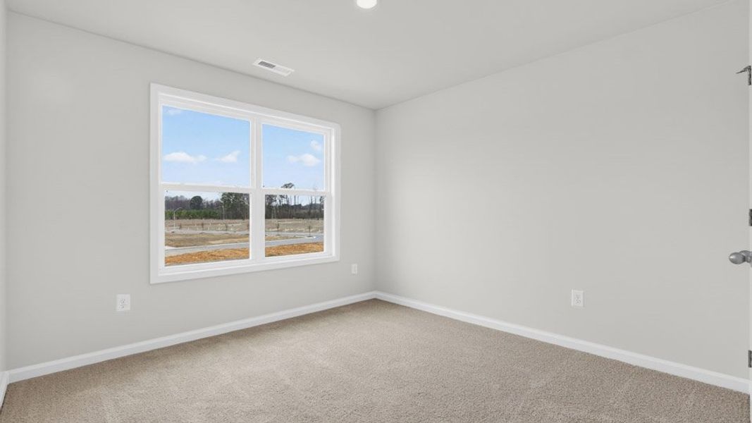 Spacious, unfurnished interior of a new home in Madden West, Fuquay Varina (Image 27).