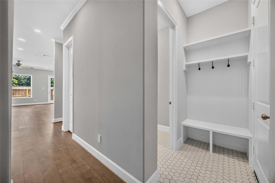 Functional Mudroom Design – A stylish and practical mudroom with built-in hooks and bench keeps your home organized and clutter-free.