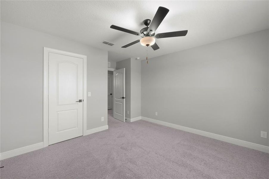 Spacious, unfurnished interior of a new home in Gum Lake Preserve, Lake Alfred (Image 17).