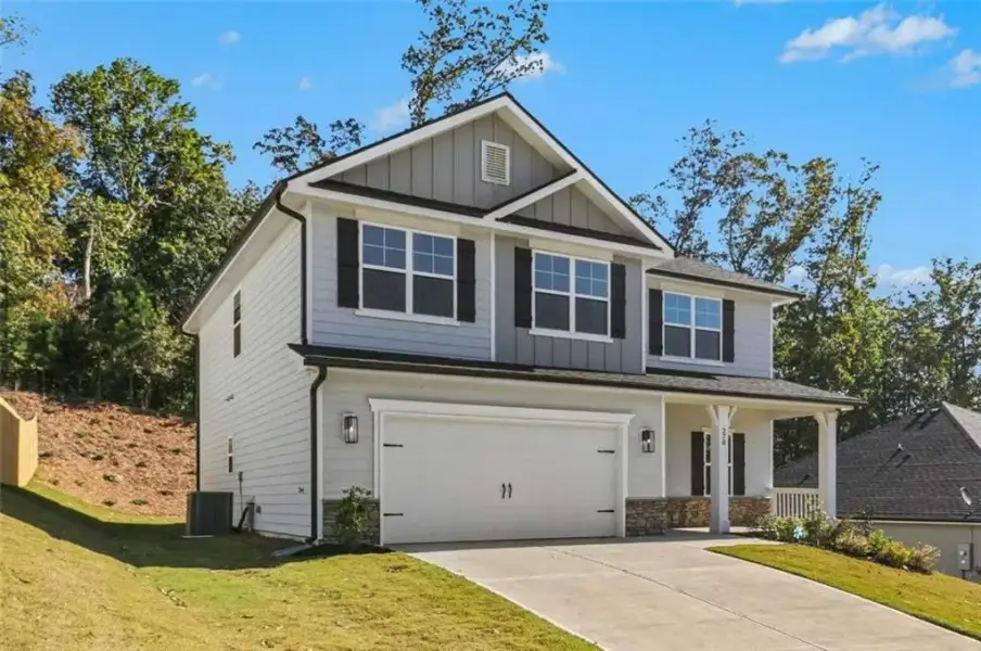 Front exterior of a new home in Thunder Ridge, Dawsonville, GA, highlighting curb appeal (Image 19).