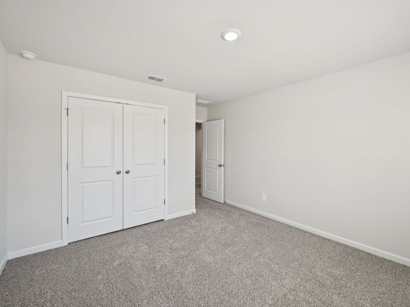 Spacious, unfurnished interior of a new home in Creekside at Oxford Park, Fairburn (Image 19).