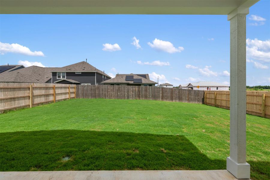 Exterior details and patio area of a home in Rolling Glen, Hutto (Image 17).