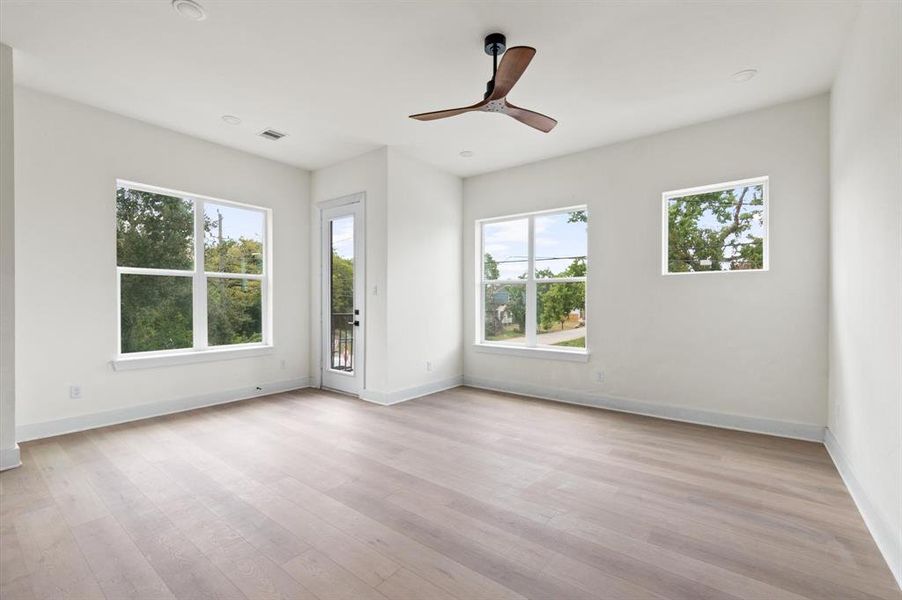 Living area off of the kitchen gets tons of natural light