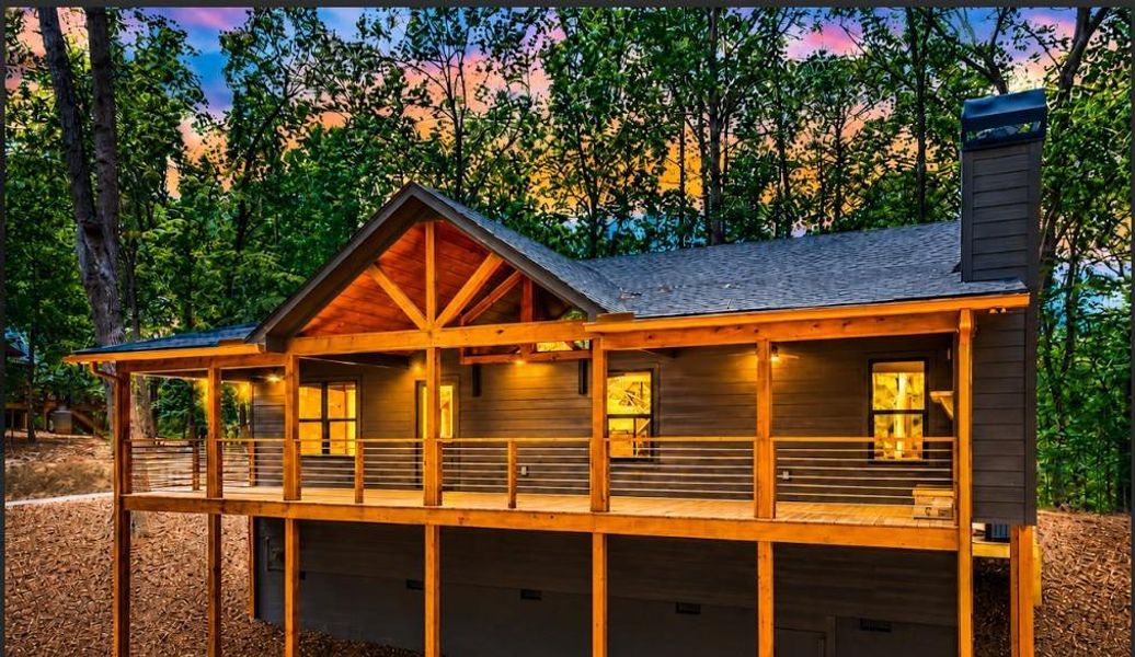 Exterior details and patio area of a home in , Ellijay (Image 26).