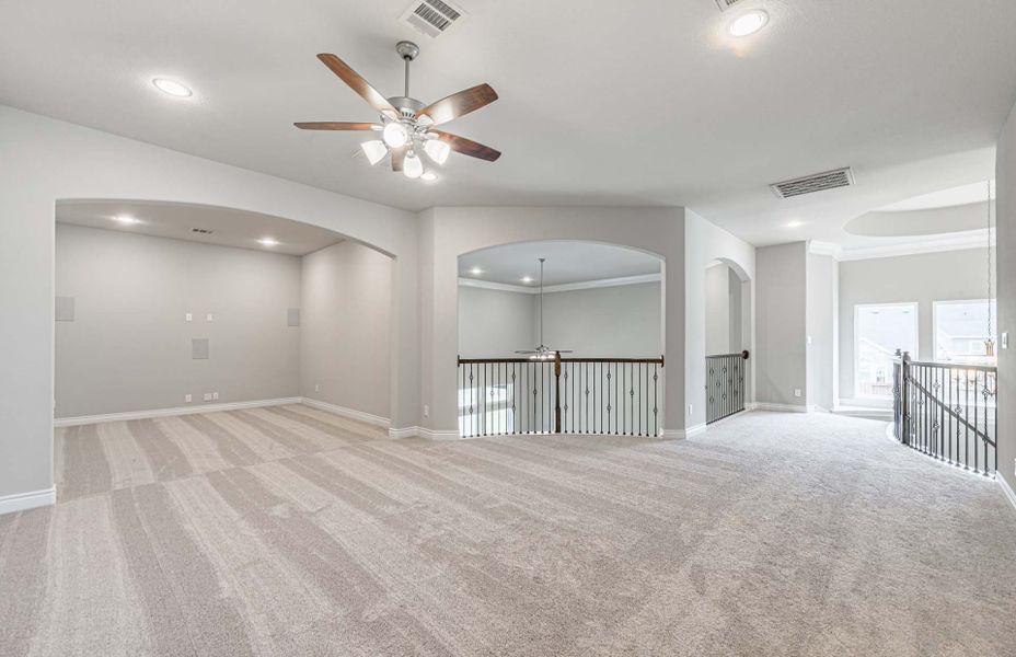 Representative unfurnished interior of a home built from the 4195 by Ravenna Homes in Artavia 70′, Conroe (Image 61). Representative unfurnished interior of a home built from the 4195 by Ravenna Homes in Artavia 70′, Conroe (Image 61).