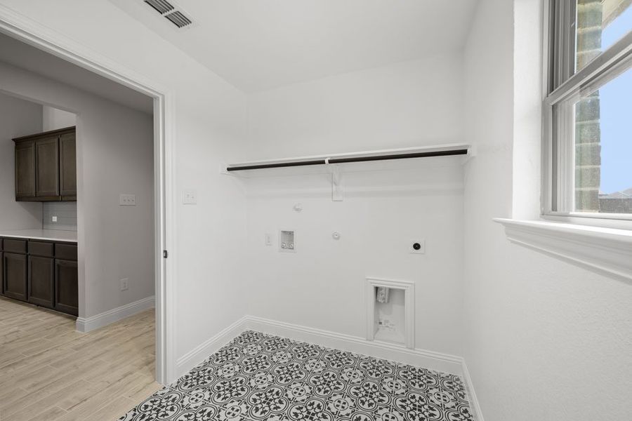 Front exterior of a new home in Still Water Lake, Godley, TX, highlighting curb appeal (Image 15). Front exterior of a new home in Still Water Lake, Godley, TX, highlighting curb appeal (Image 15).