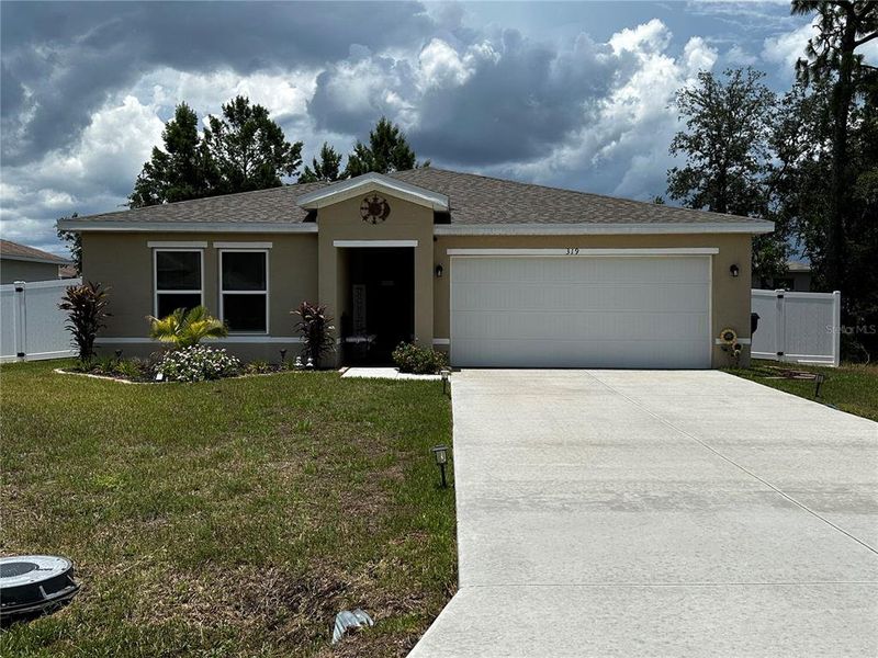 Front exterior of a new home in , Kissimmee, FL, highlighting curb appeal (Image 1). Front exterior of a new home in , Kissimmee, FL, highlighting curb appeal (Image 1).