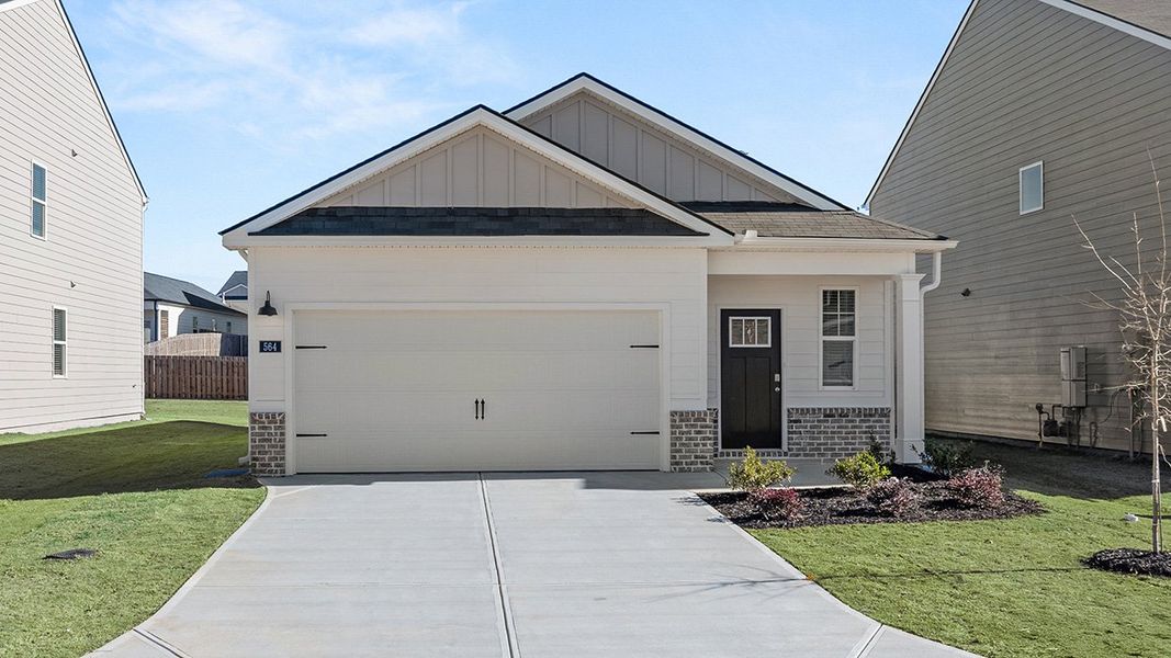 Front exterior of a new home in The Abbey at Trolley Run Station, Aiken, SC, highlighting curb appeal (Image 1). Front exterior of a new home in The Abbey at Trolley Run Station, Aiken, SC, highlighting curb appeal (Image 1).