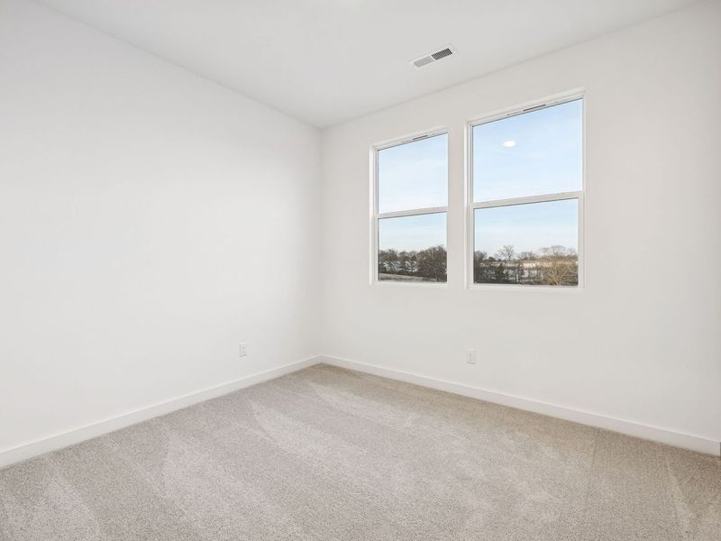 Spacious, unfurnished interior of a new home in Calista Farms, White House (Image 24).