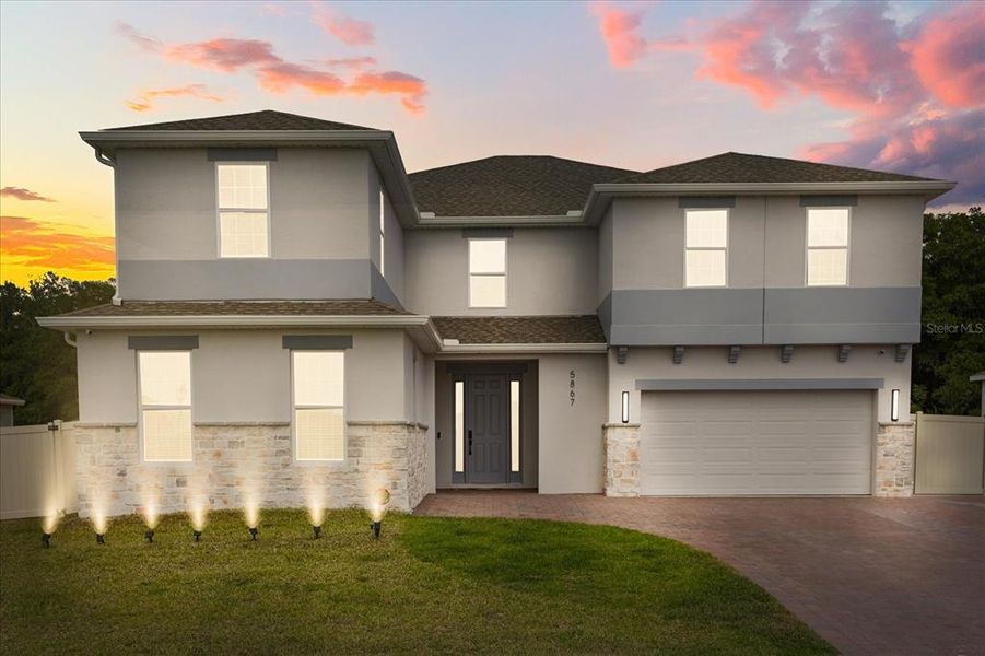 Front exterior of a new home in Bargrove Estates, Mount Dora, FL, highlighting curb appeal (Image 2). Front exterior of a new home in Bargrove Estates, Mount Dora, FL, highlighting curb appeal (Image 2).