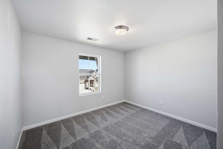 Spacious, unfurnished interior of a new home in Macanta, Castle Rock (Image 21).
