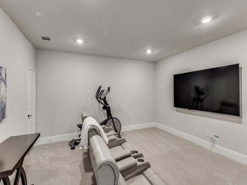 Exercise area featuring carpet and recessed lighting
