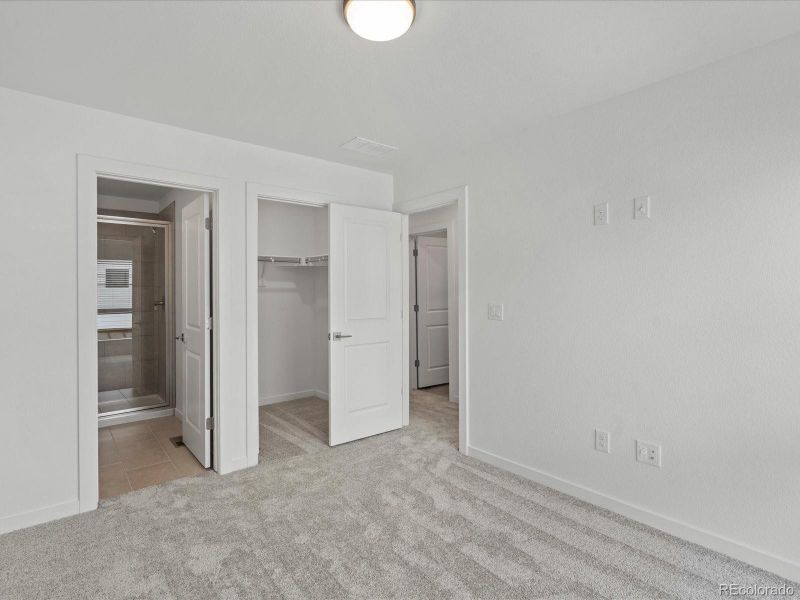 Spacious, unfurnished interior of a new home in The Hub at Virginia Village, Denver (Image 25).