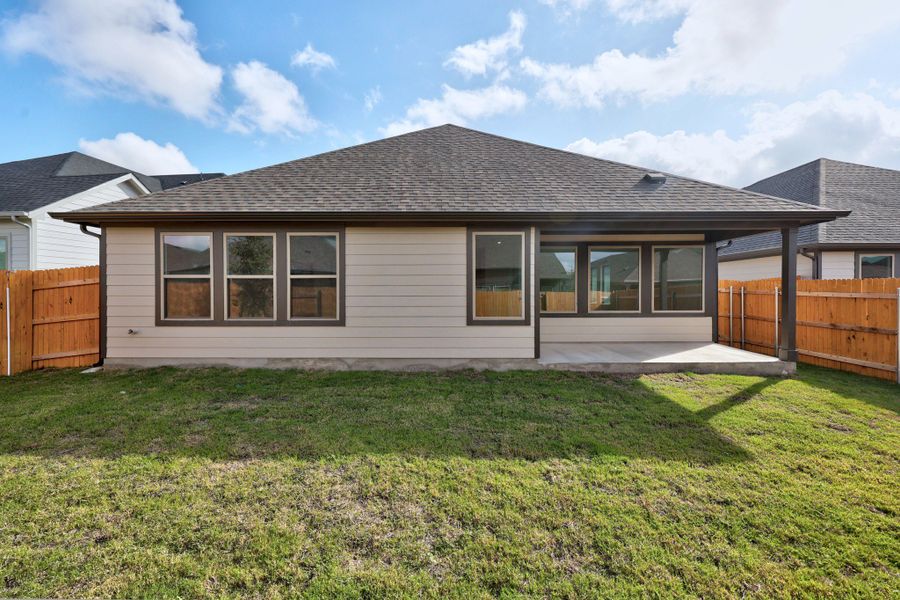Exterior details and patio area of a home in Prairie Winds, Hutto (Image 4).