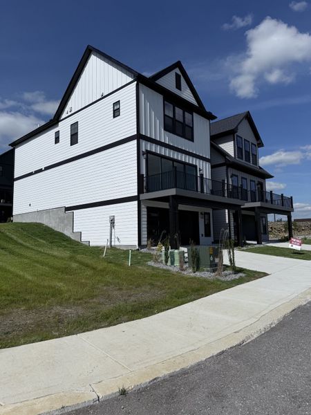 Front exterior of a new home in Ridgecrest at Whites Creek, Whites Creek, TN, highlighting curb appeal (Image 12).