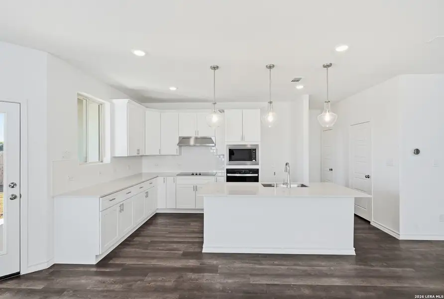 Furnished interior view inside a new home in Nopal Valley, San Antonio (Image 5).