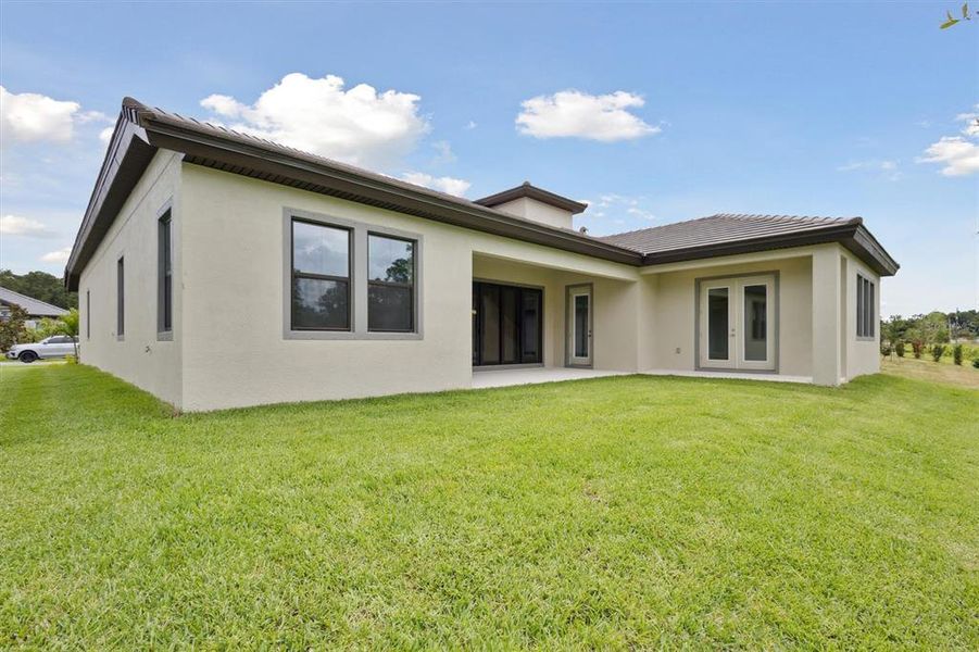 Front exterior of a new home in Hidden Lakes, Brandon, FL, highlighting curb appeal (Image 2).