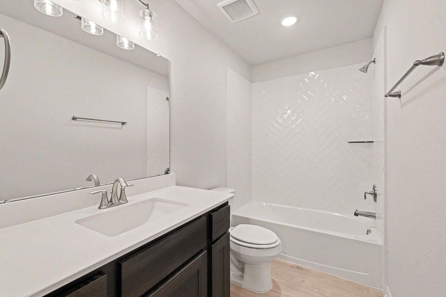 Furnished interior view inside a new home in Rose Hill Estates, Willis (Image 13).