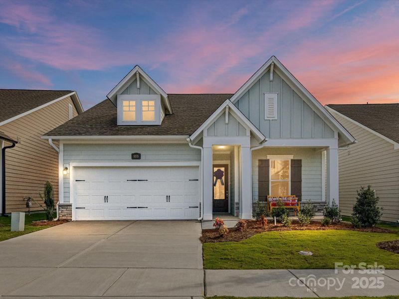 Front exterior of a new home in Encore at Streamside - Classic Series, Waxhaw, NC, highlighting curb appeal (Image 30).