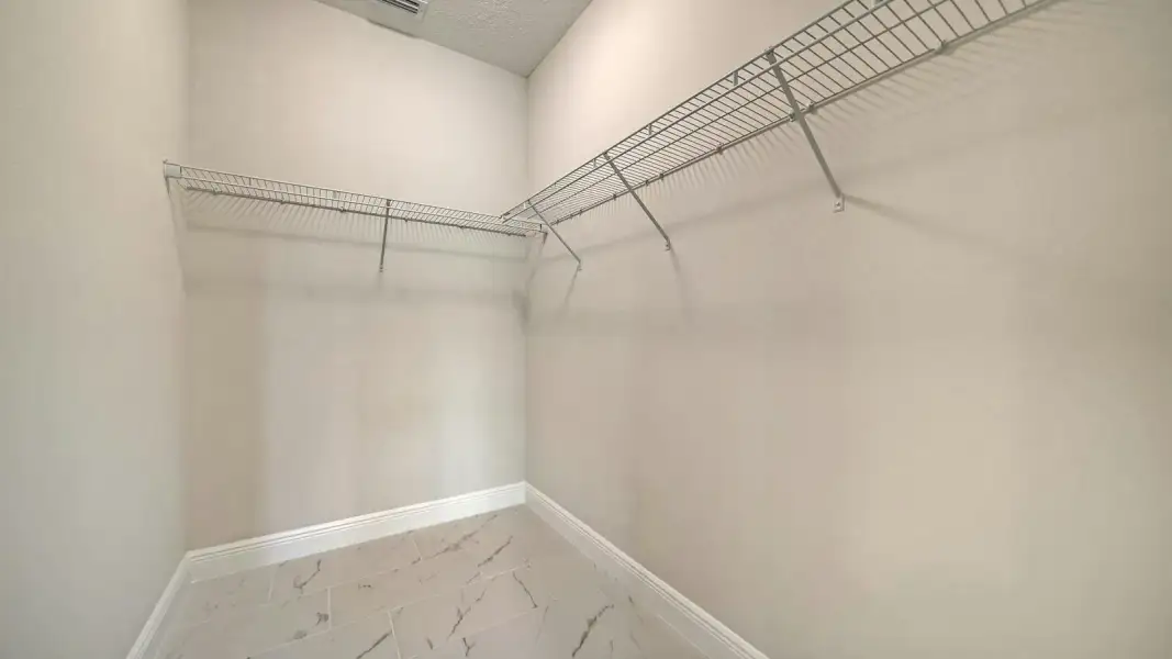 Spacious, unfurnished interior of a new home in Windward Real Estate and Homes for Sale in Sarasota, FL - Neal Communities, Sarasota (Image 33). Spacious, unfurnished interior of a new home in Windward Real Estate and Homes for Sale in Sarasota, FL - Neal Communities, Sarasota (Image 33).