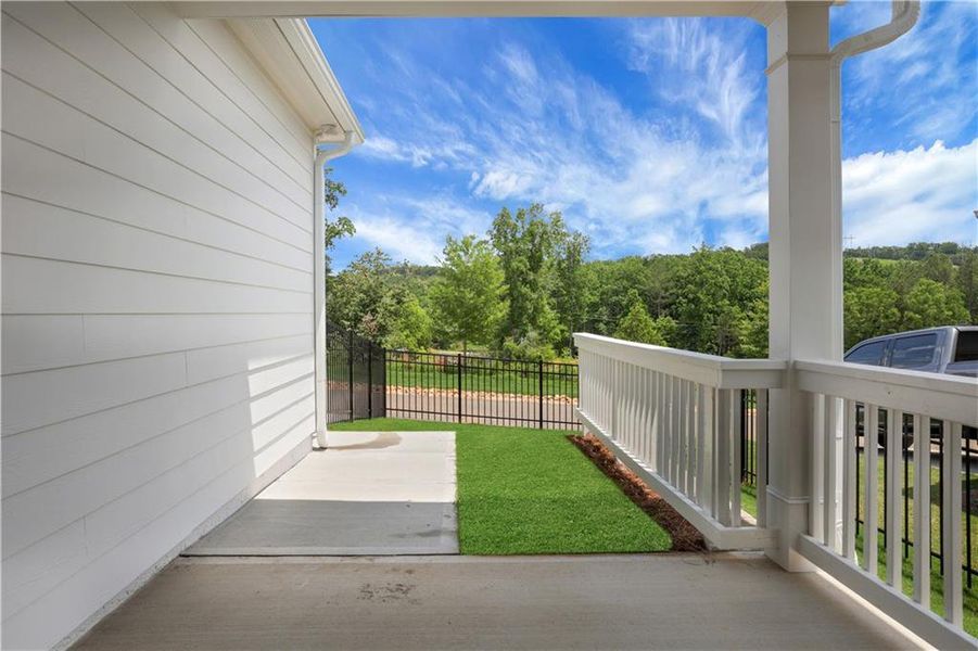 Exterior details and patio area of a home in Marble Tree, Ball Ground (Image 4).