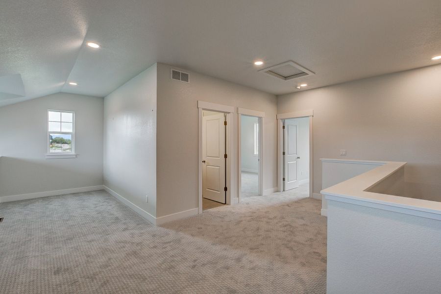 Representative unfurnished interior of a home built from the The Addison by Landmark Homes in The Lakes at Centerra, Loveland (Image 19). Representative unfurnished interior of a home built from the The Addison by Landmark Homes in The Lakes at Centerra, Loveland (Image 19).