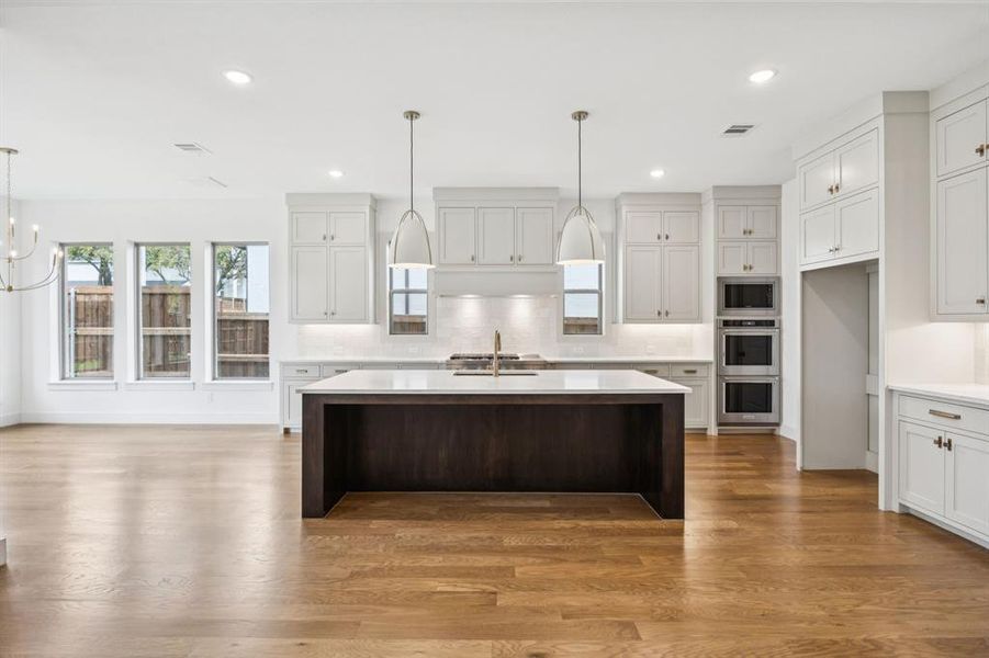 A light, bright and spacious chef's kitchen is only one of the fantastic design elements in this dream home!
