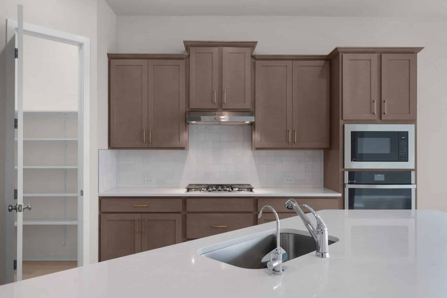 Furnished interior view inside a new home in University Heights, Round Rock (Image 7).