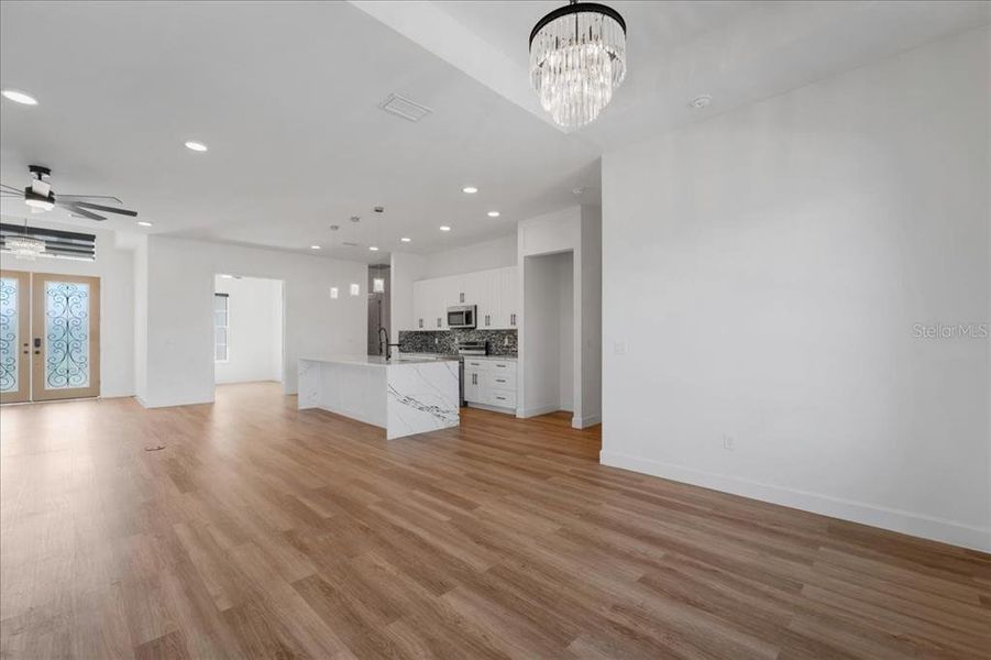 Spacious, unfurnished interior of a new home in , Port Charlotte (Image 38).