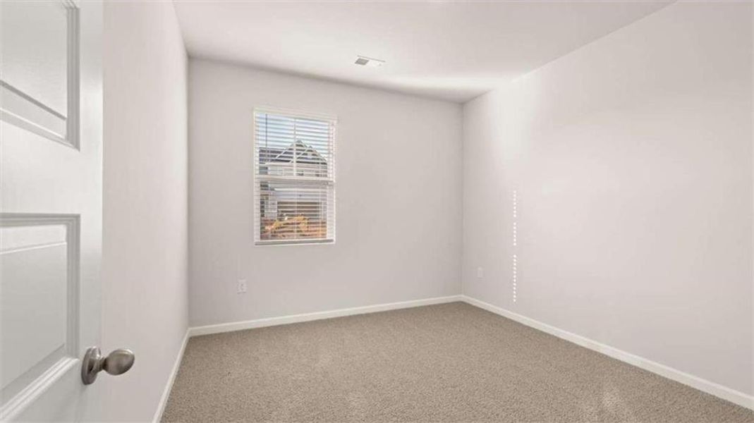 Spacious, unfurnished interior of a new home in Preserve at Dove Creek, Statham (Image 35).