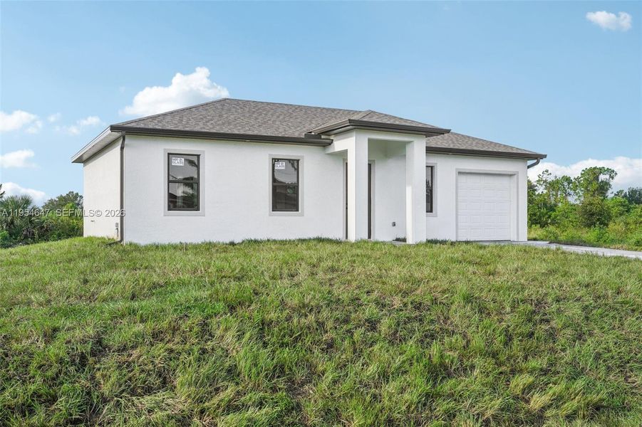 Exterior details and patio area of a home in , Lehigh Acres (Image 3).